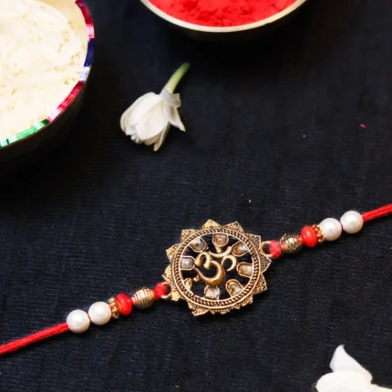 Om Metal Rakhi